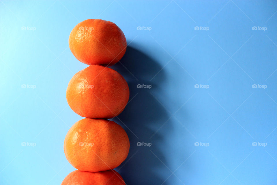 tangerines in blue