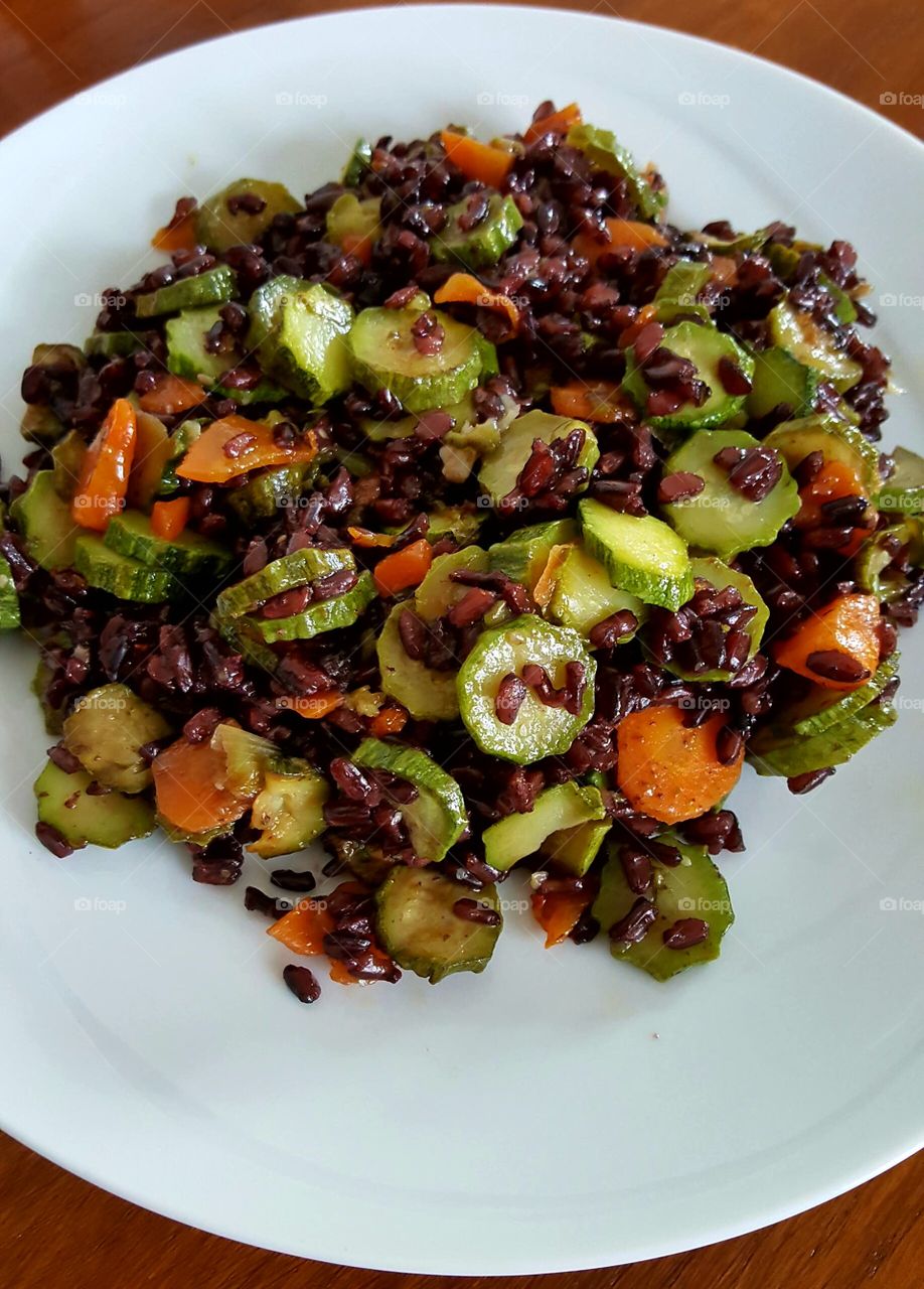 black rice with carrots and zucchini