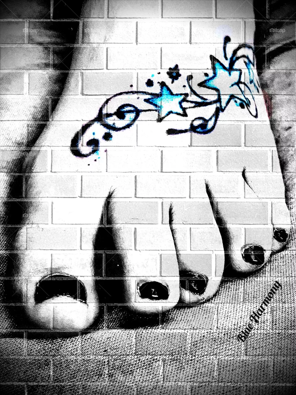 A beautiful tattoo of the stars line music for a musician. Feet are beautiful salon and others businesses 