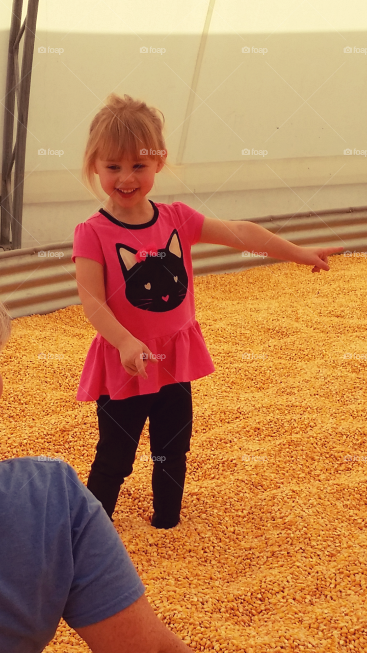 Playing in the corn