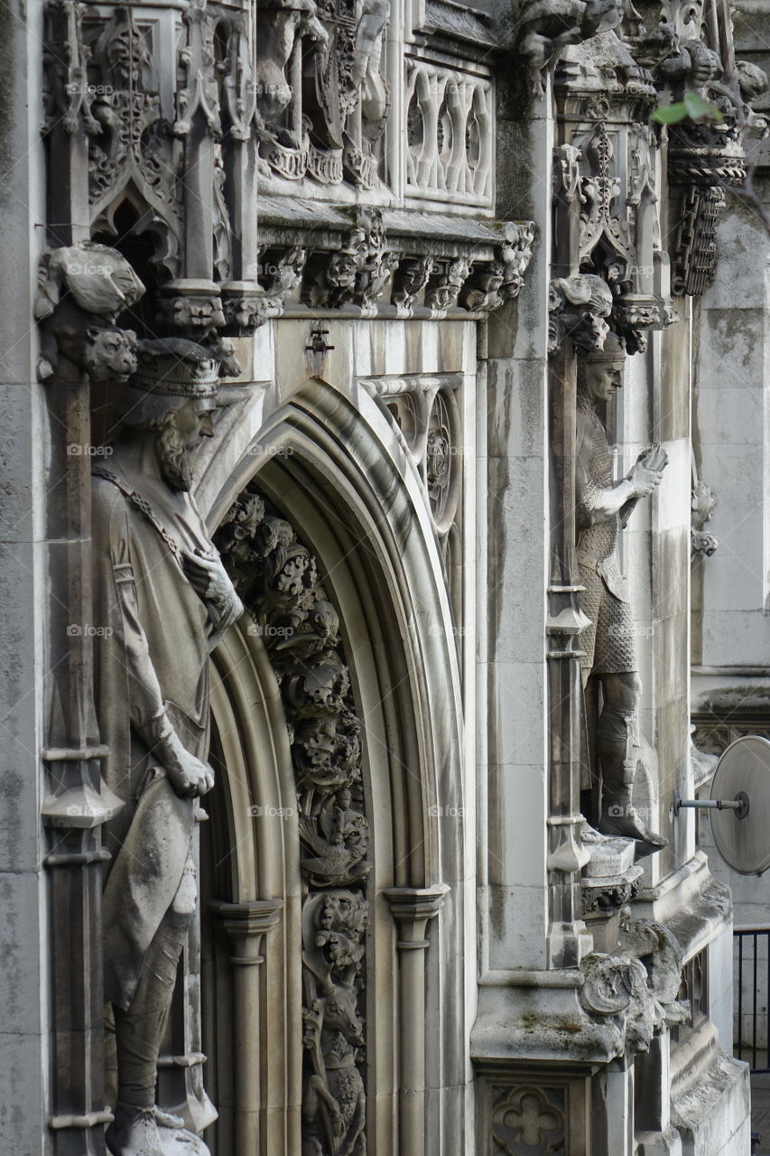 Intricate carvings on the side of the government building in London, England. 
