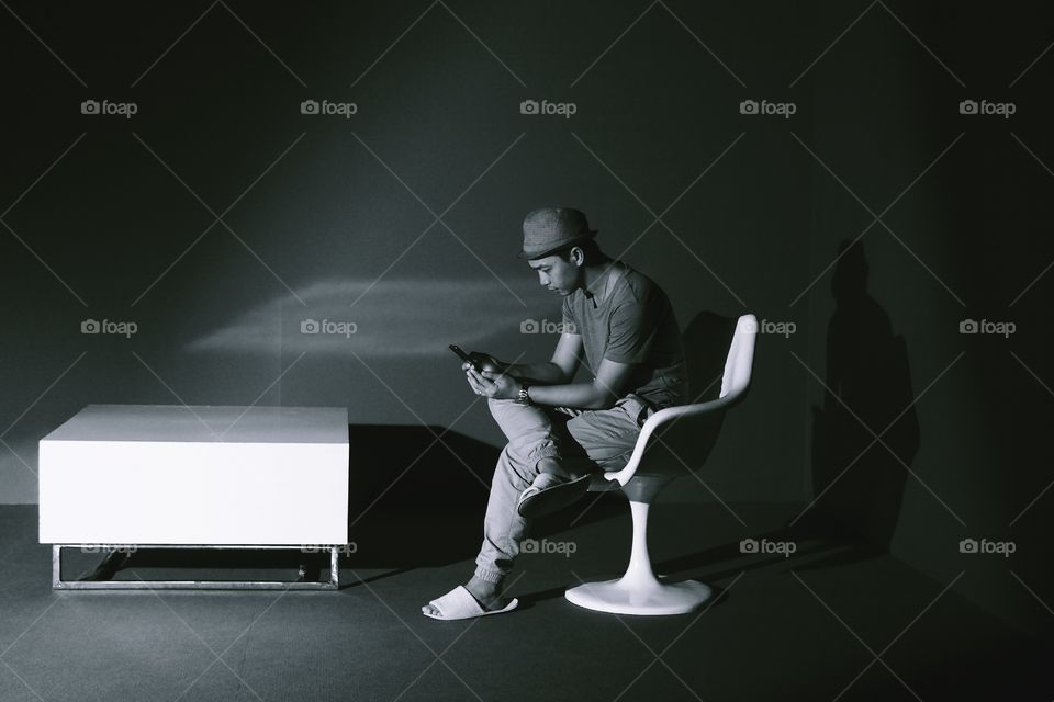 man playing smartphone, emotion