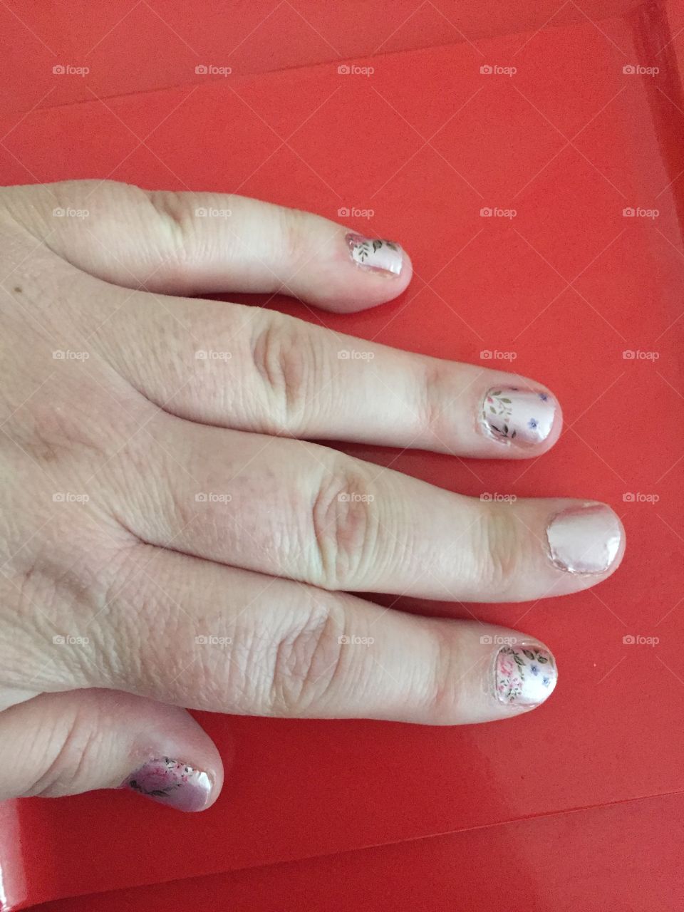 Skin Care, Lotioned Hands, Nail Manicure, Pink, Purple, Roses Dark Pink, Pink and Dark Pink and Green on Red. Sideways. Artsy.