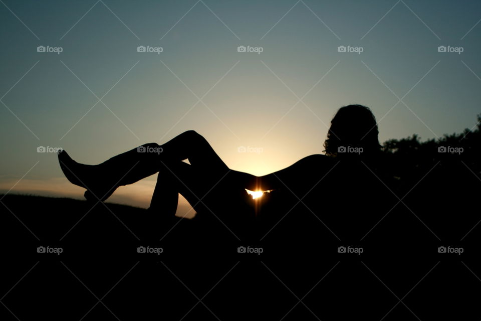 Silhouette on a Hay Bale