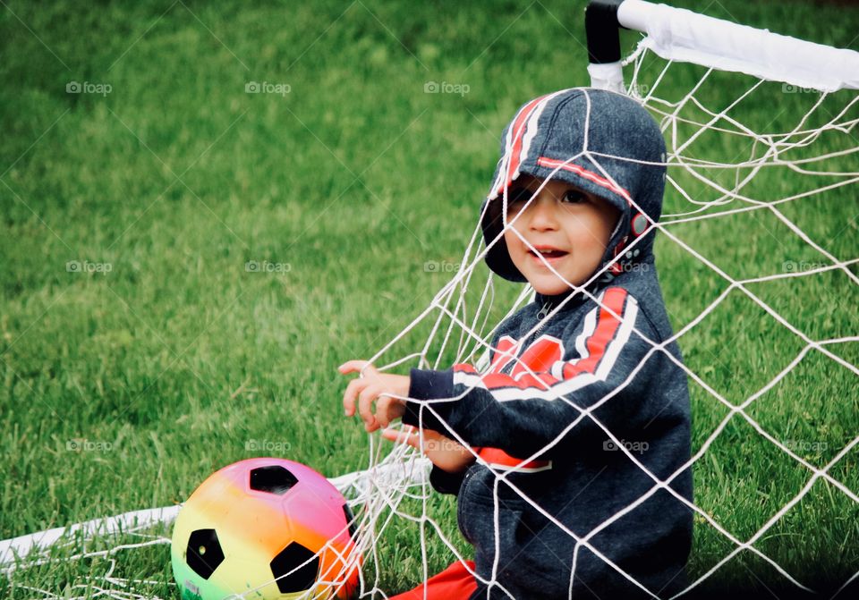 Being silly during the soccer game 