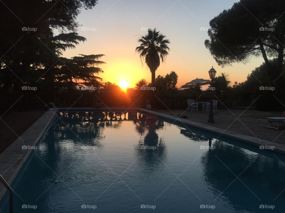 swimming pool, sunset