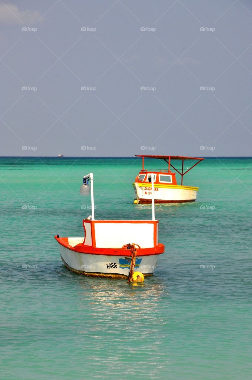 Boats in caribbean sea