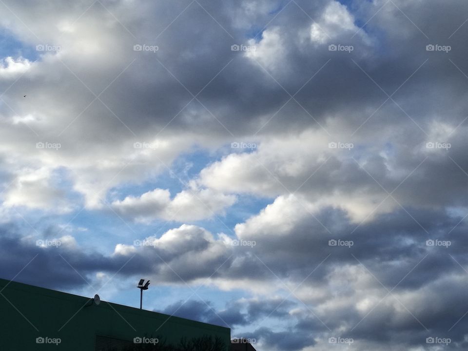 Sunset. Clouds on a blue sky