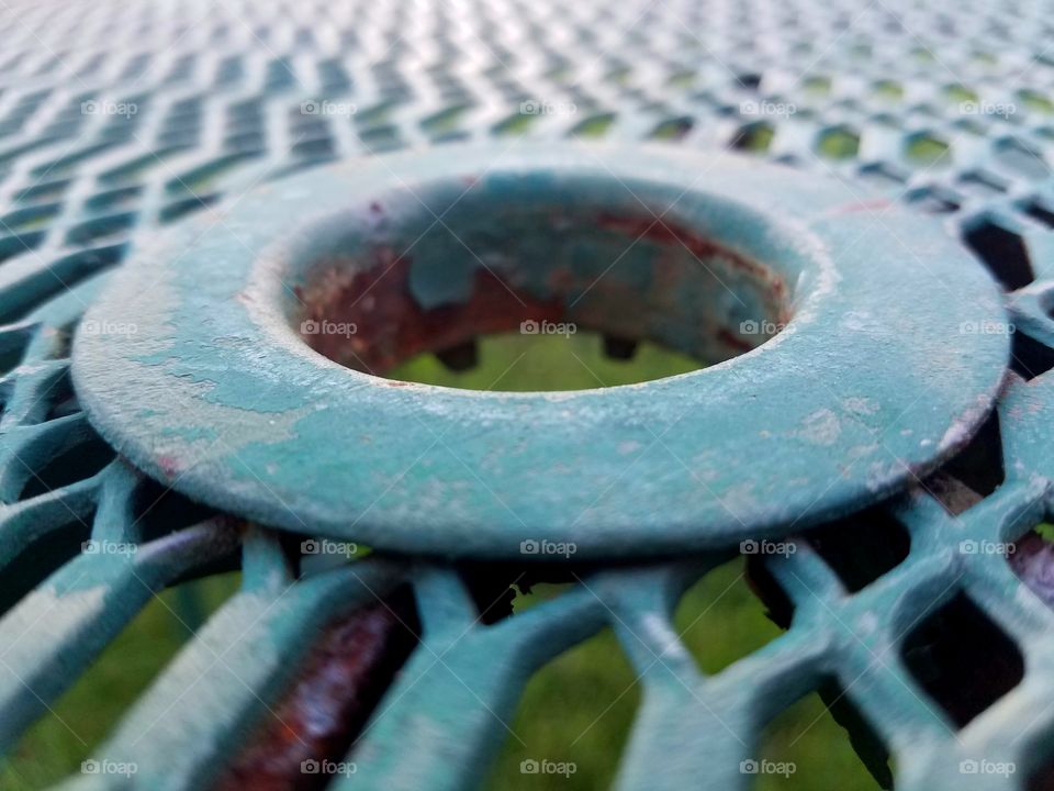 close-up of metal outdoor table top