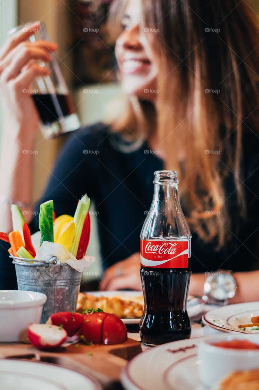 Have fun and drinking Coca-Cola 