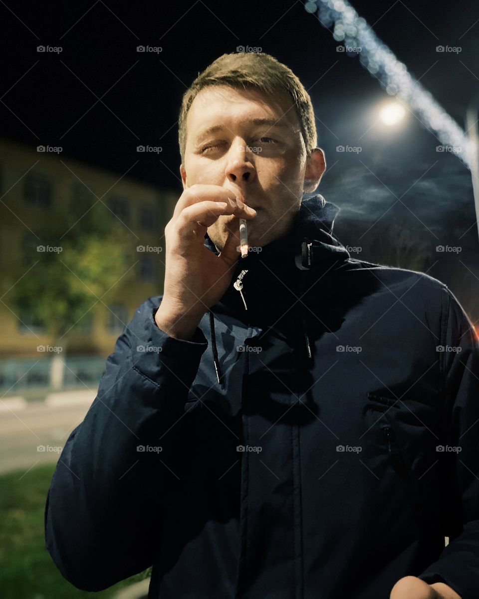 Man smoking in outdoors