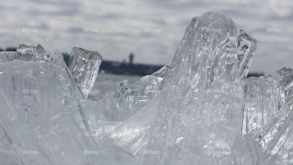 Bicentennial Tower . This photo was taken across the bay from the Bicentennial Tower in Erie, Pennsylvania. I love how the ice formed those long crystals, I had never seen them before.