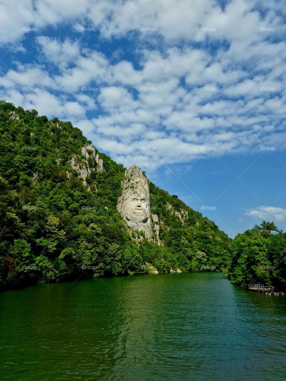 clouds above the sculpture of King Decebalus