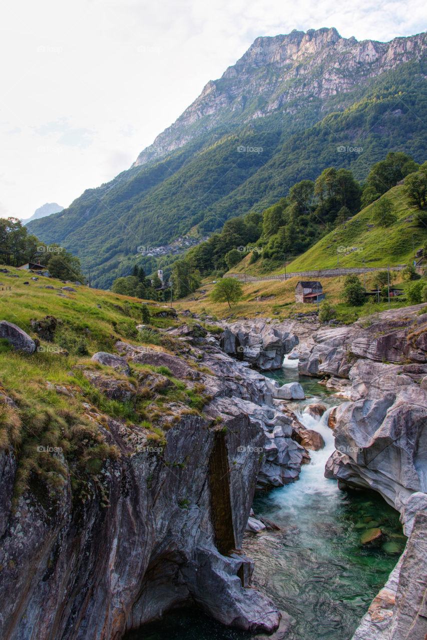 River flowing through rockys in landscape