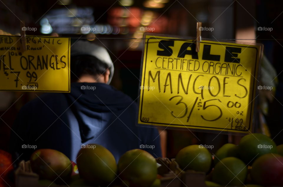 Organic mangoes captured in an urban style photograph.