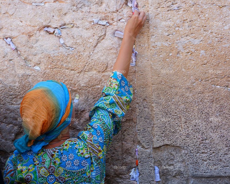 Amazing  watch all the Ladies rush 
To put their Prayer in The Wailing Wall. :)