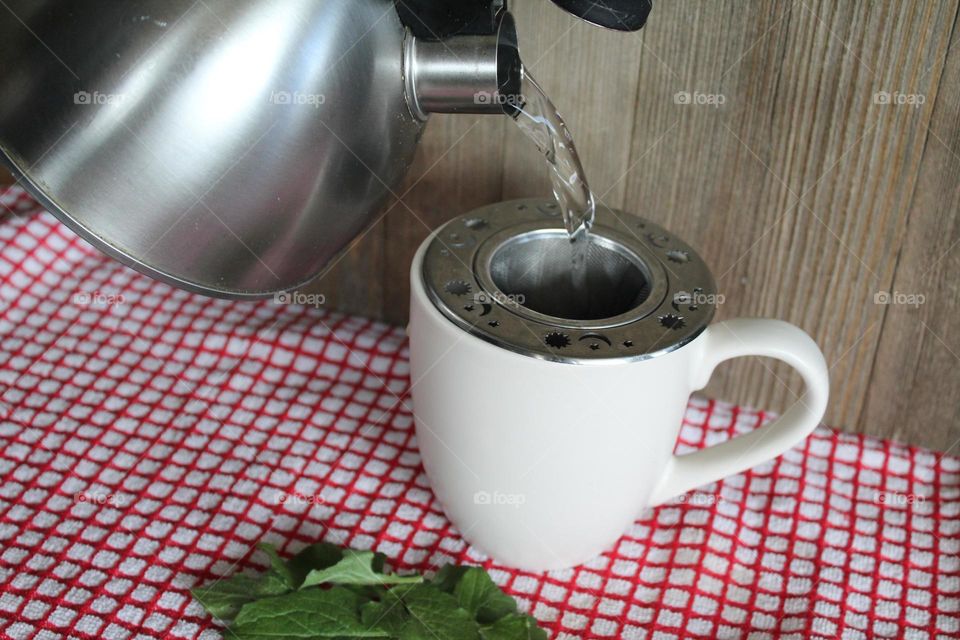 Water being poured in cup