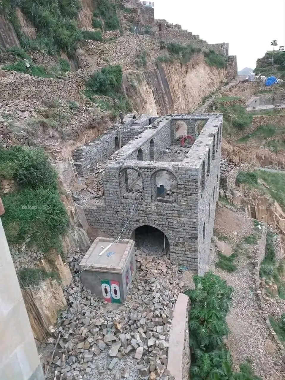 A stunning view of green mountains covered in fog in Yemen