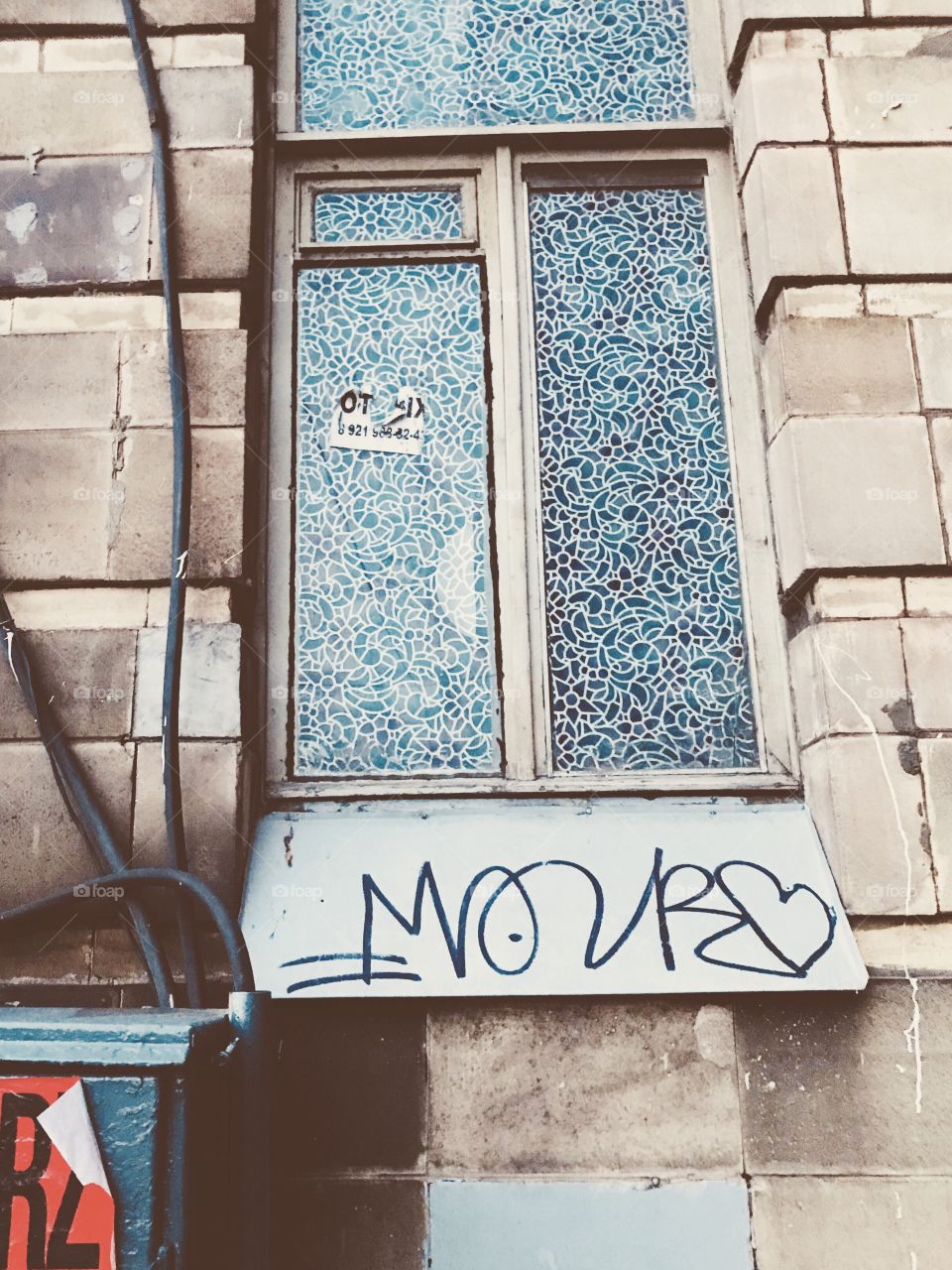 just a window of one of St. Petersburg's houses .. Street taging morning