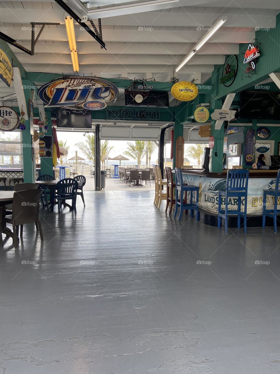 A beach bar with indoor and outdoor seating where you can kick back, enjoy a beer and burger, and view the ocean. This is Jenks Inlet Bar & Restaurant and is known for being where the locals hang out on the Point Pleasant Beach boardwalk in NJ. 