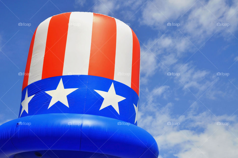 Red white and blue Uncle Sam themed parade float.