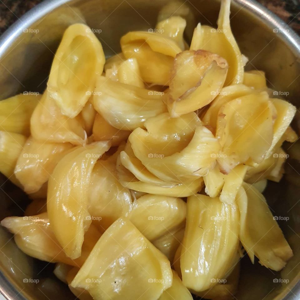 Jackfruit is one of the common fruit bearing trees in the Philippines. It has fragrance as well as delicious, crunchy and chewy taste. This was given by our neighbor as a whole fruit and cleaned it so it is easier to eat. The yellow color is golden.