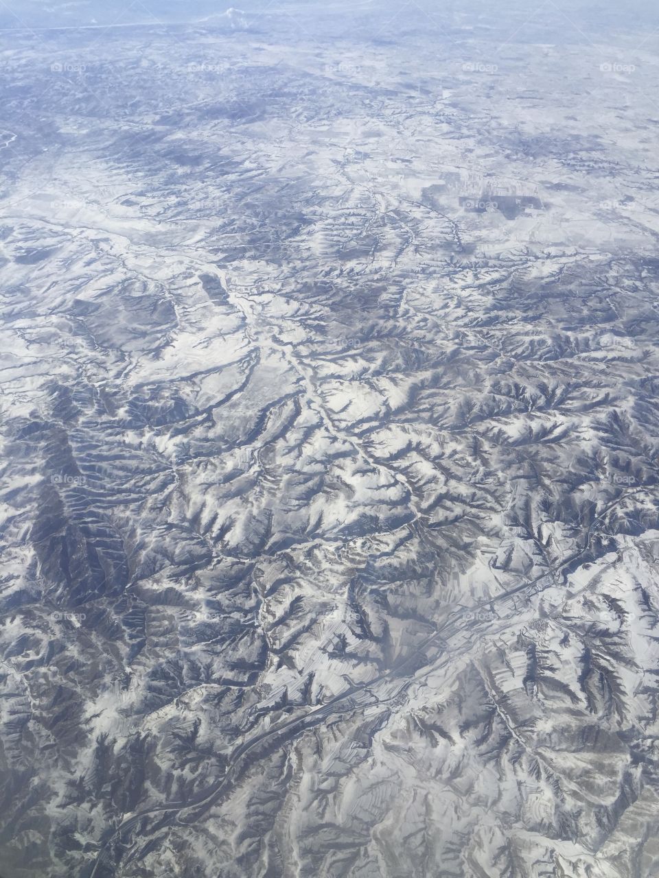 Mountains covered with snow from illuminator 