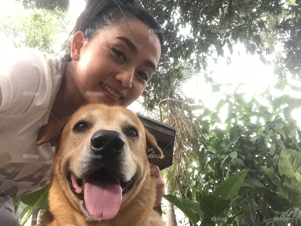 Wothan, good boy! When you said that, his face just acts like this. Half breed dog in Thailand.