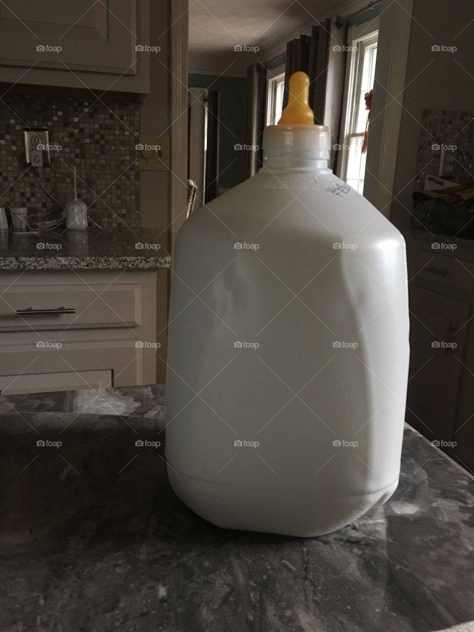 A gallon sized baby bottle.