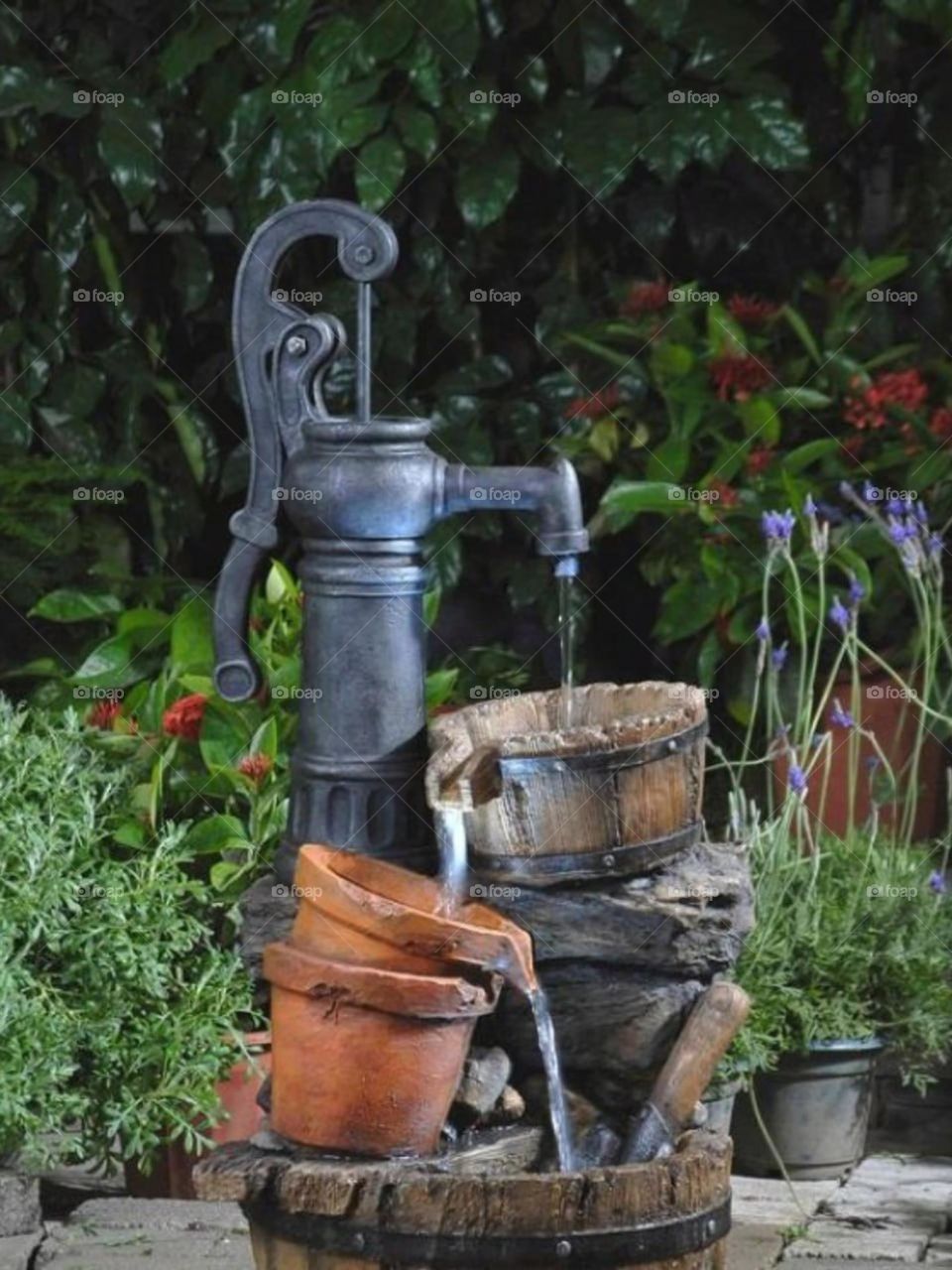 A beautiful old design water pomp in the park