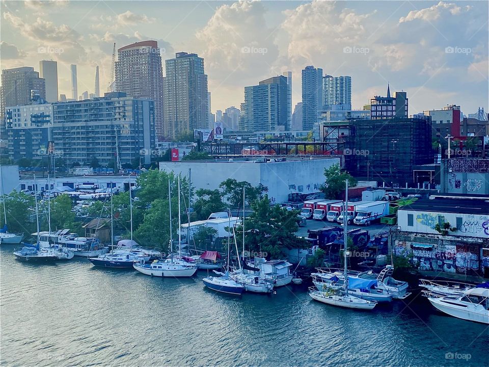 These boats are tied to the shore at “Newtown Creek” by the “Pulaski Bridge” in LIC, Queens, NY. I think that they add to the special appeal that this centrally located area already has by giving it an idyllic vibe. 2023. Hypnotic Productions