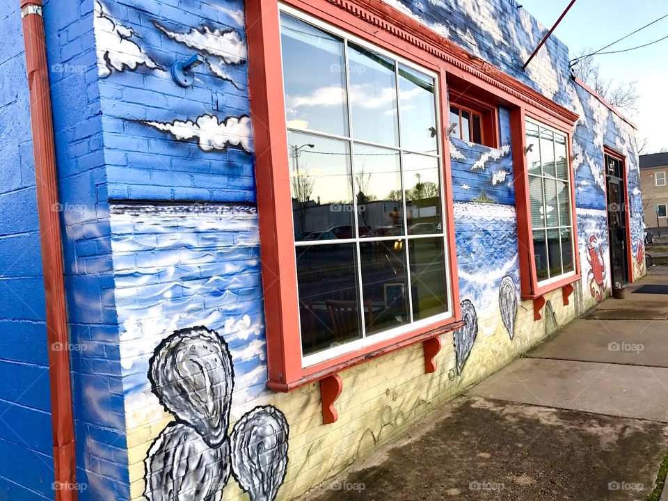 Side View of nautical painted restaurant building 