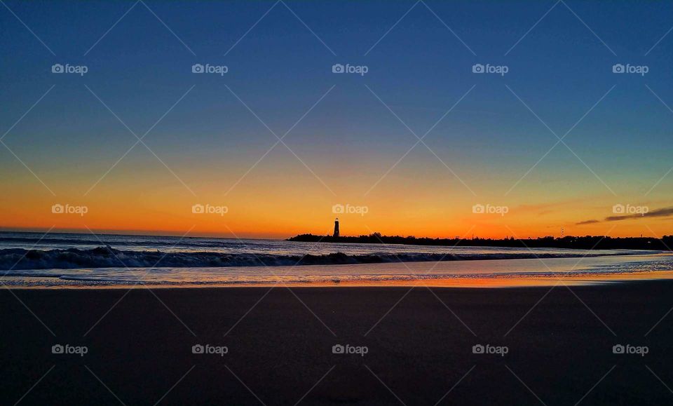 Colorful sunset at Walton lighthouse in Santa Cruz