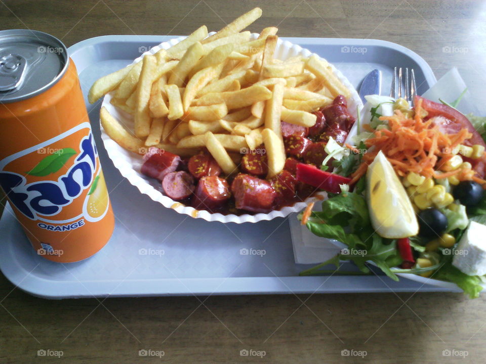 lunch with potato fries and hotdogs