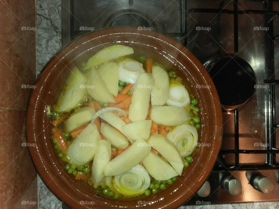 Delicious morocxan Tajine made with various vegetables and meat.