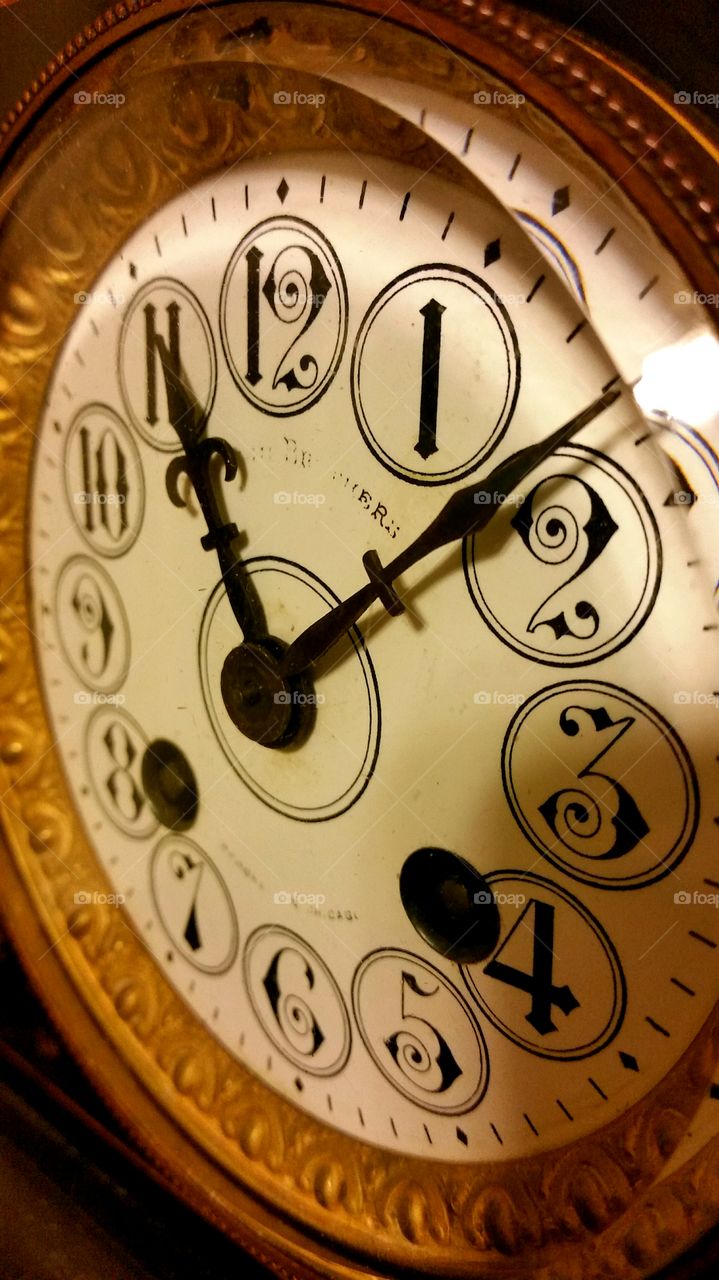 Old Clock Face. Ornate old clock face and hands