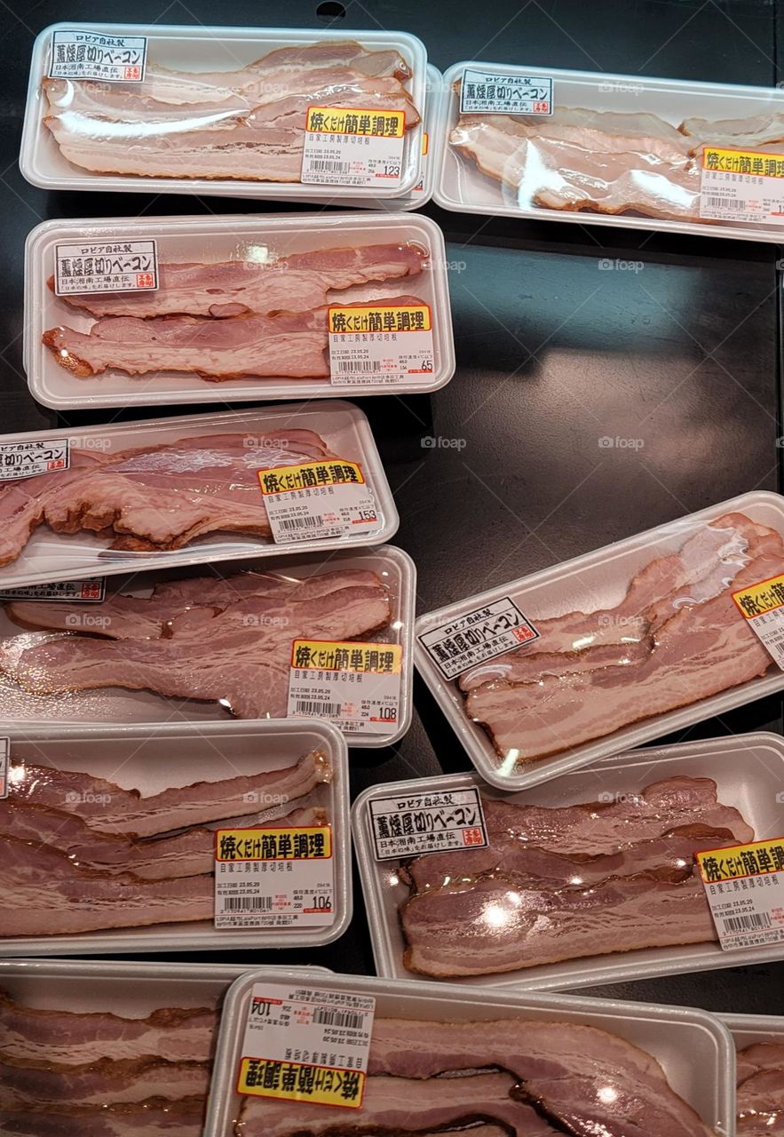 Thick cut bacon in supermarket.