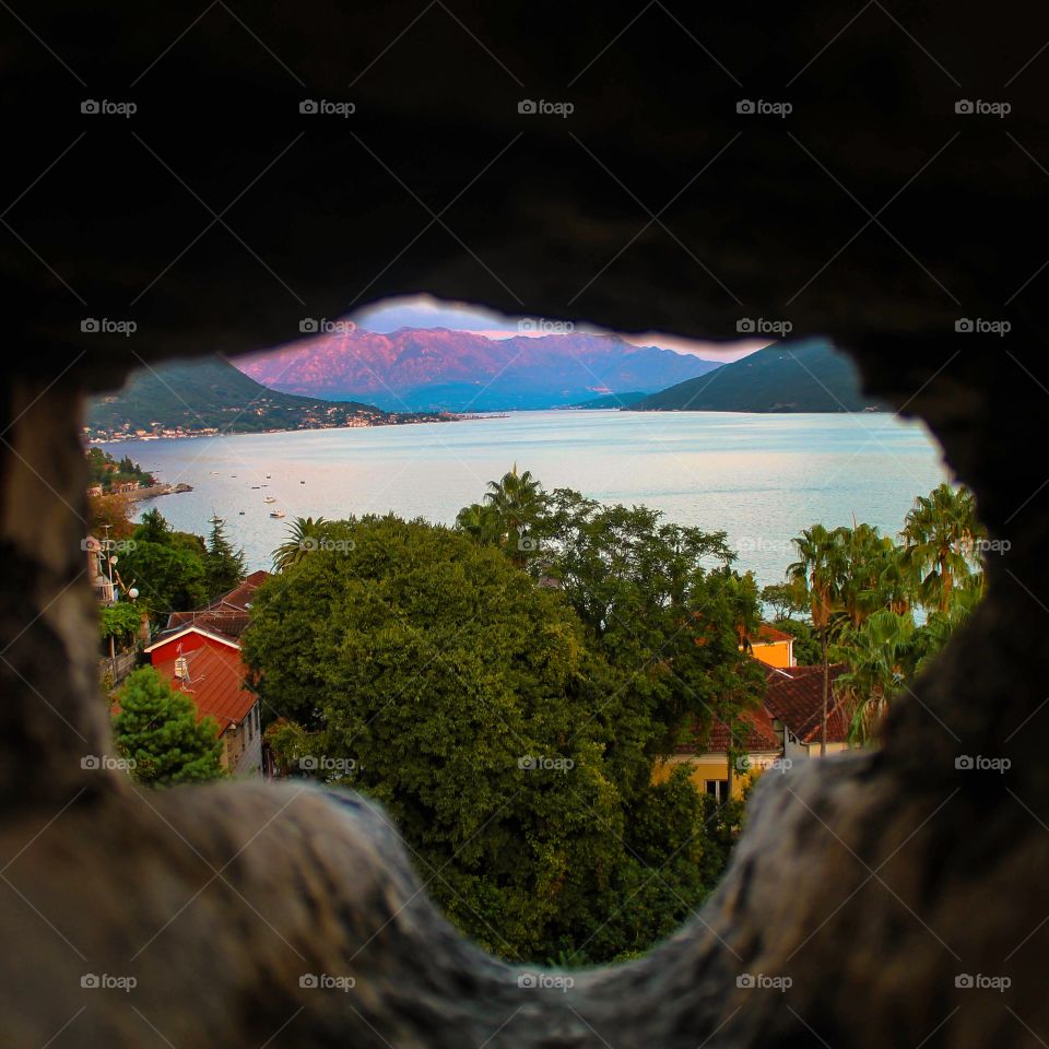 Scenic view seen through rock