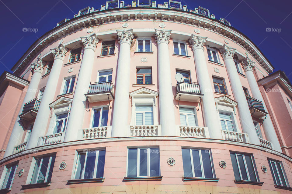 Low angle view of building against blue sky