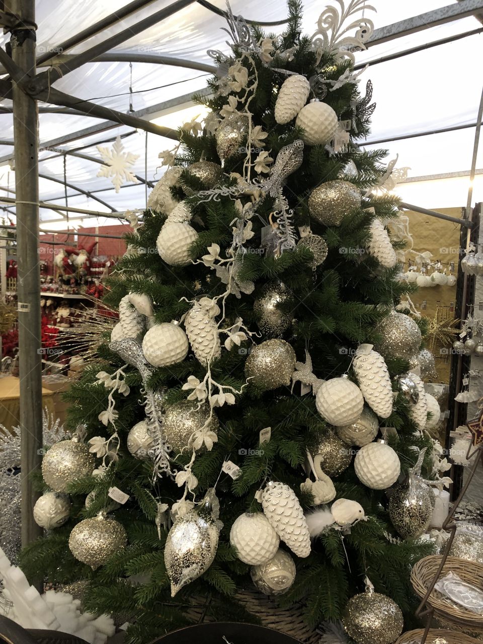 This is another taster for Christmas with the rather luxurious Christmas tree all decked out so tastefully with a cream colour theme.