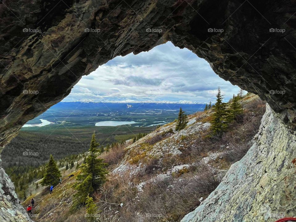 Hiking up from the cave on a cloudy spring day