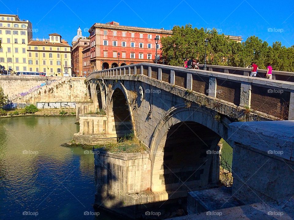 Bridge over Tiber River in Rome Italy
