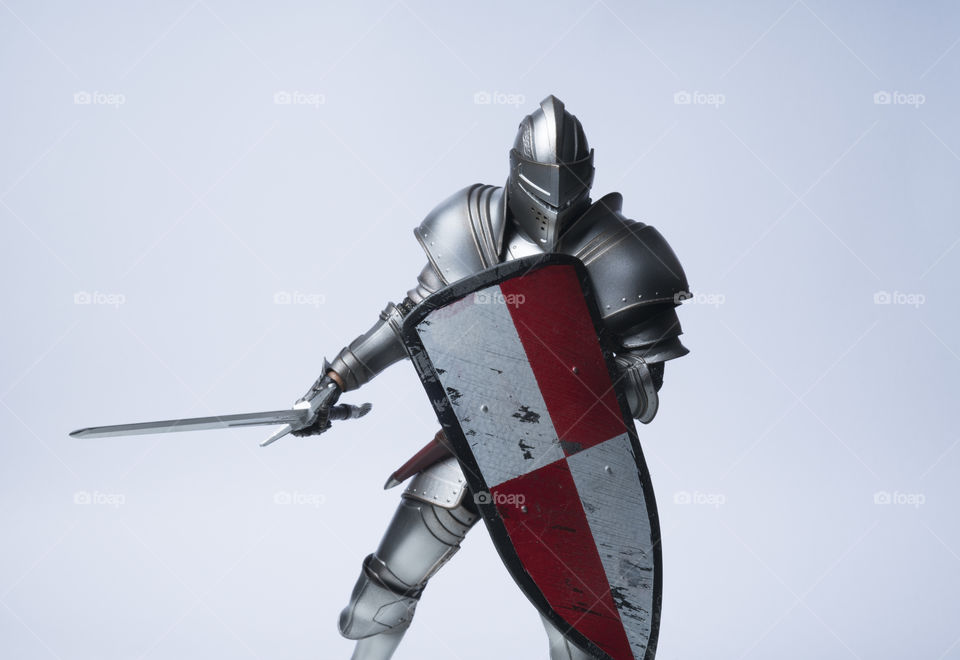 Knight with red checked shield and sword