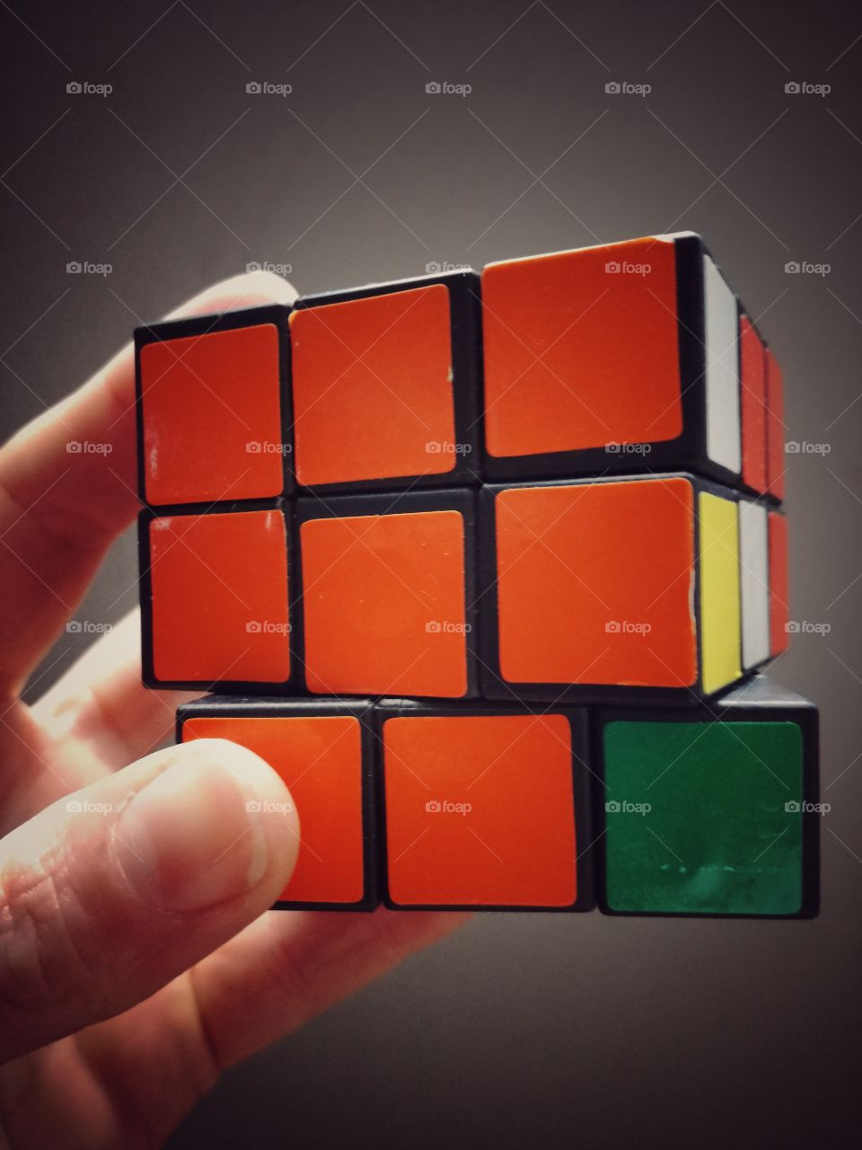 Person holding rubik's cube