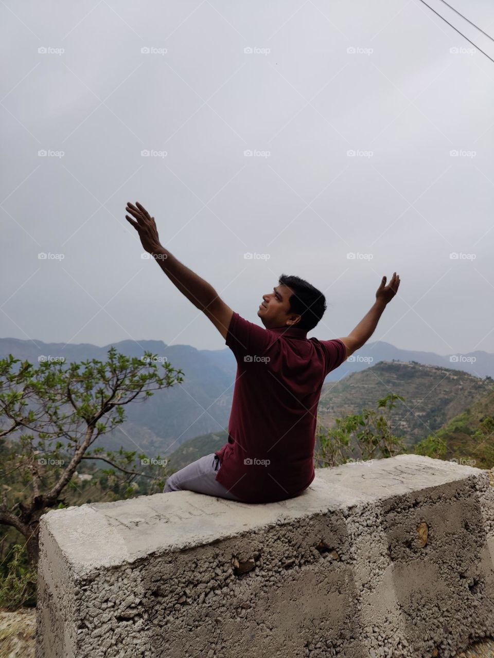 Man resting and enjoying on the mountain