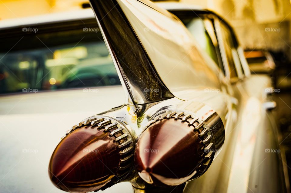 Beautiful stop signal of a vintage car with a wing or tail