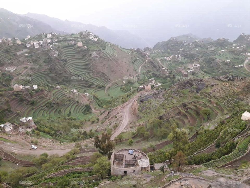 Glory be to God, the magnificent and picturesque view and the natural green trees are a view that is nothing more wonderful than it