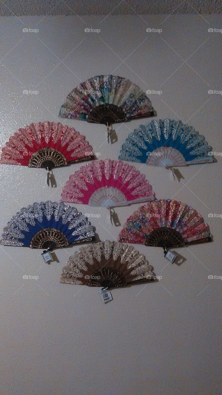 fans on a wall