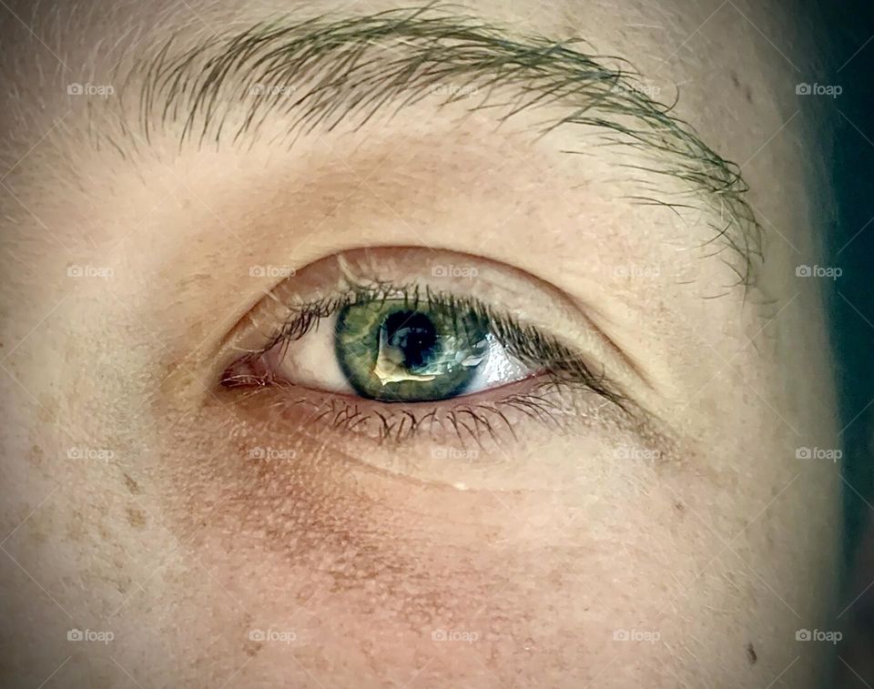 Youthful, green eye