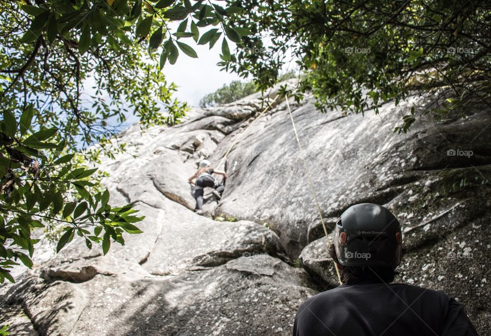 climbing a rock